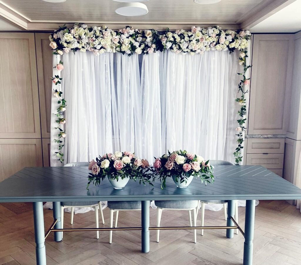 White-roses-silk-backdrop-stcatherines-Flower-Arch-Wedding-Rental 1024x900