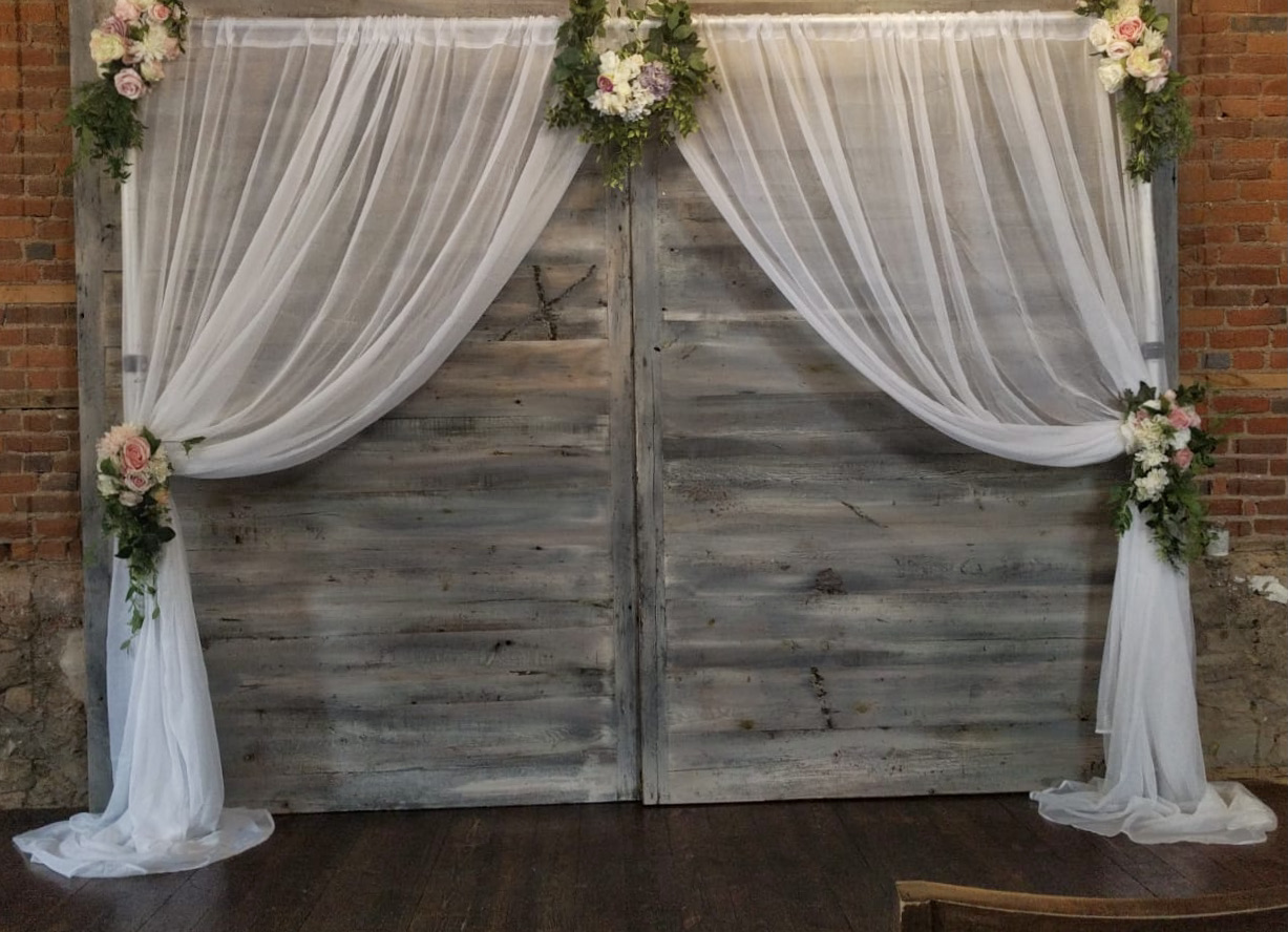 london flower arch rental with drapes