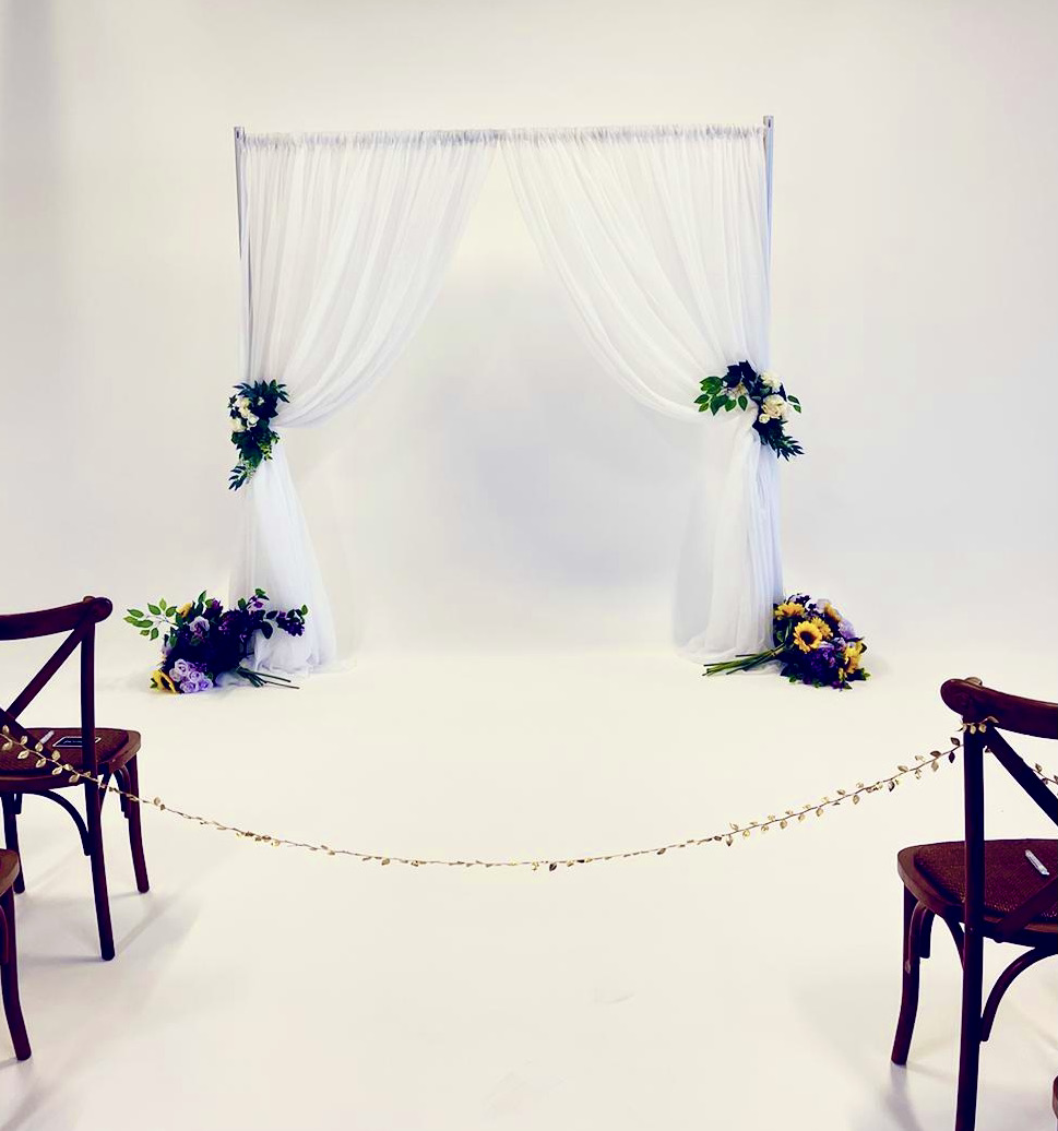 milton flower arch with drapes