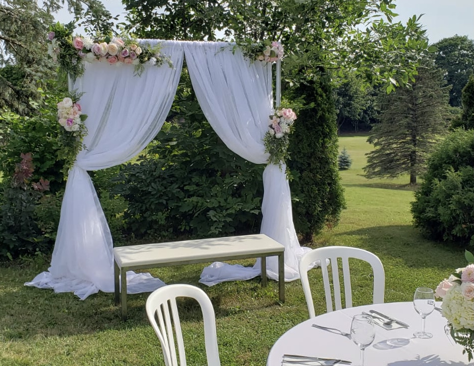 waterloo flower arch with drapes rental
